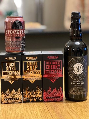 Beer! Three cans of Surly Darkness, a 750ml bottle of Pryes Lost Moon, and a can of Stockyard oatmeal stout.