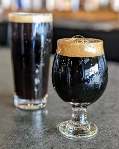 Left: Black beer in a pint glass. A porter.
Right: Black beer in a snifter. A stout.