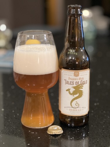 New Holland Brewing Dragon’s Milk Tales of Gold bourbon-barrel aged Golden Ale, this time with a white label and a golden dragon and lettering.
