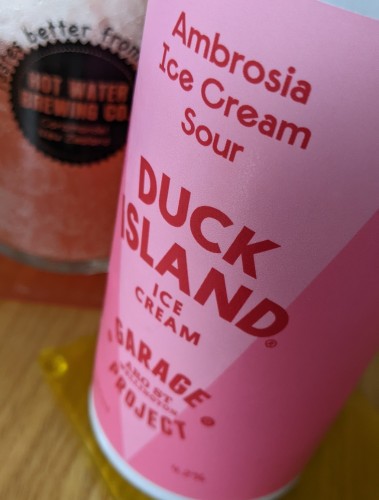 Close up of this canned brew: Garage Project and Duck Island bring you Ambrosia Ice Cream Sour.

Glass vaguely in the background.